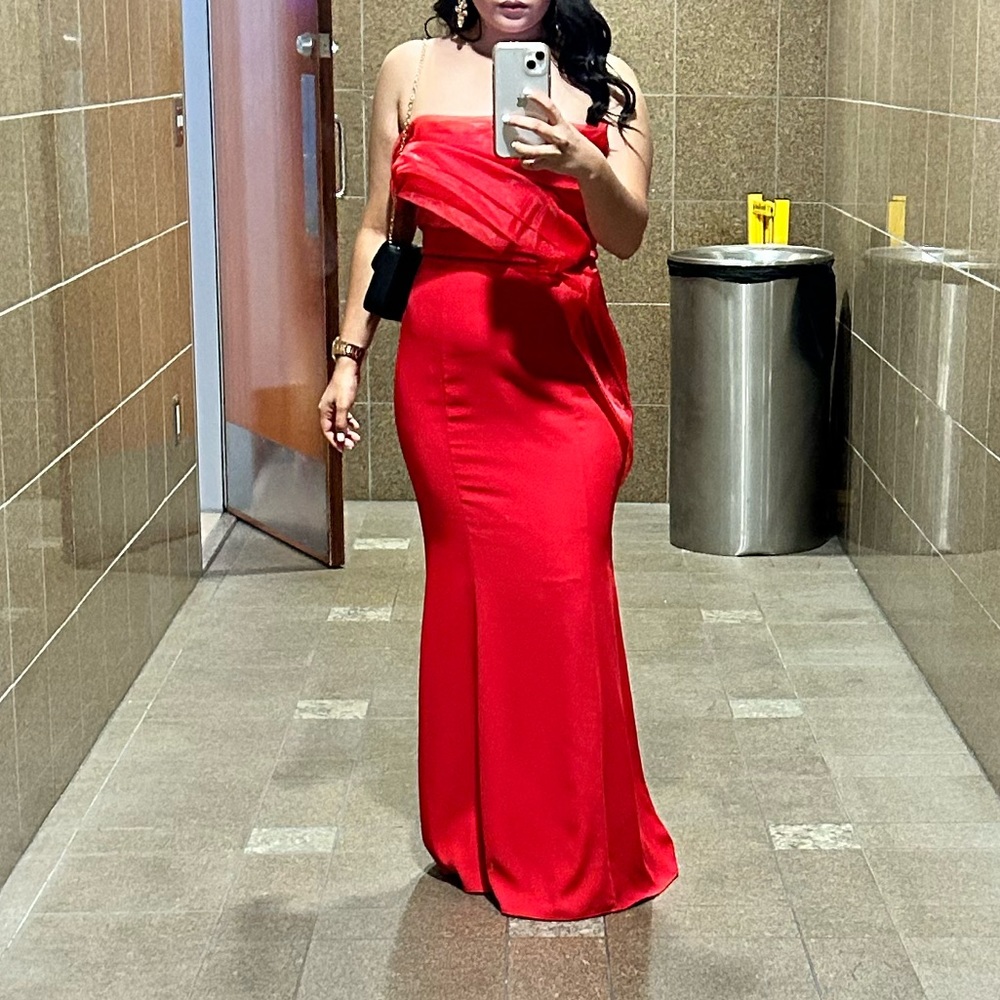 Red strapless dress with front ruffle.